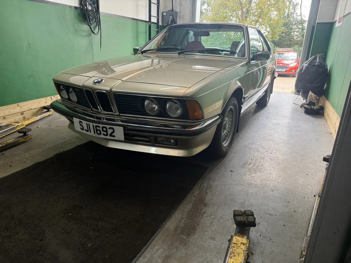 Classic silver BMW in the workshop at Goblin Automotive