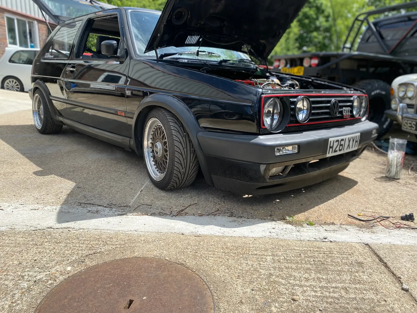 Specialist cars outside Goblin Automotive workshop for diagnostics